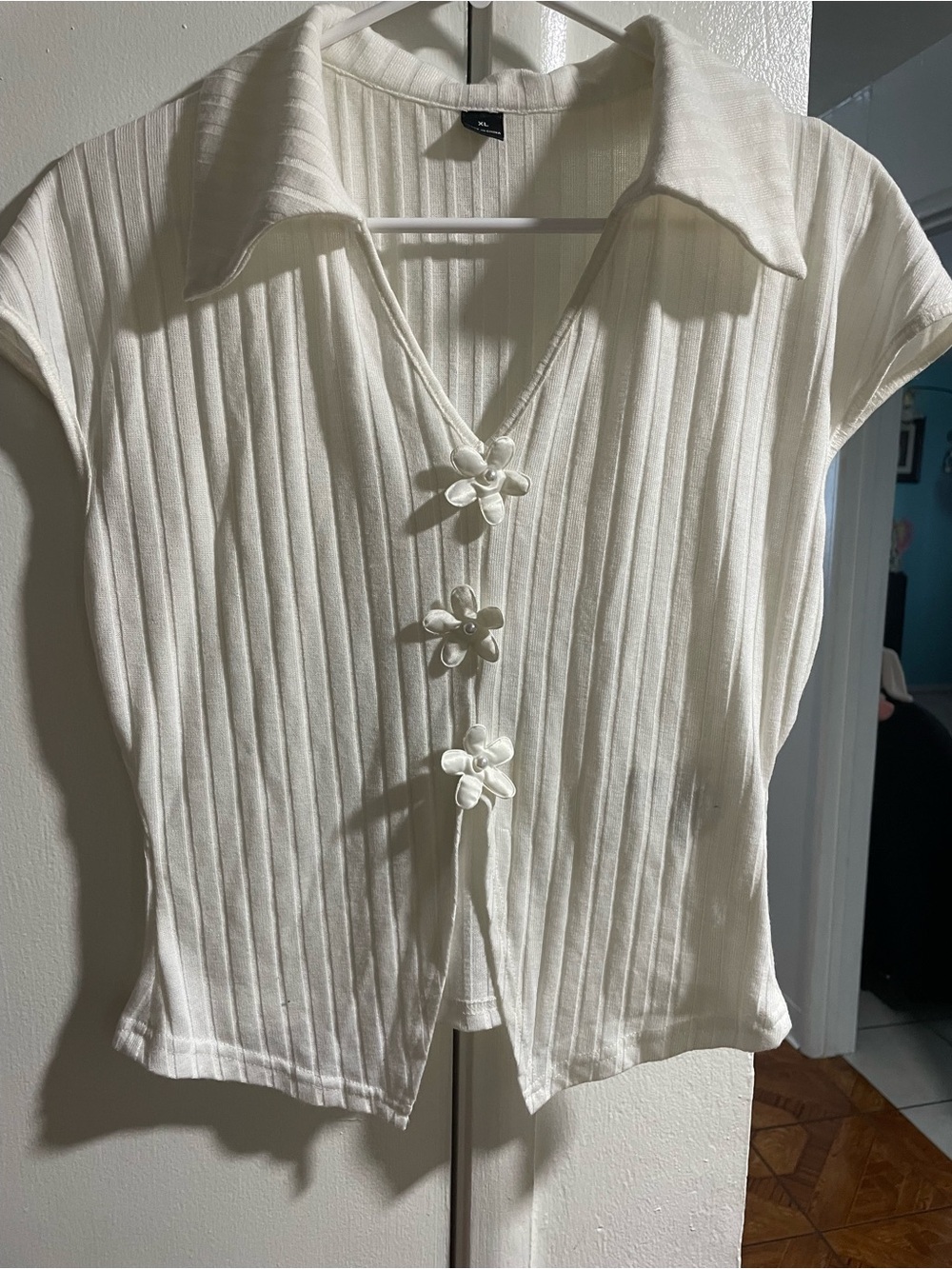Women's Cream Ribbed Collared Top with Floral Buttons